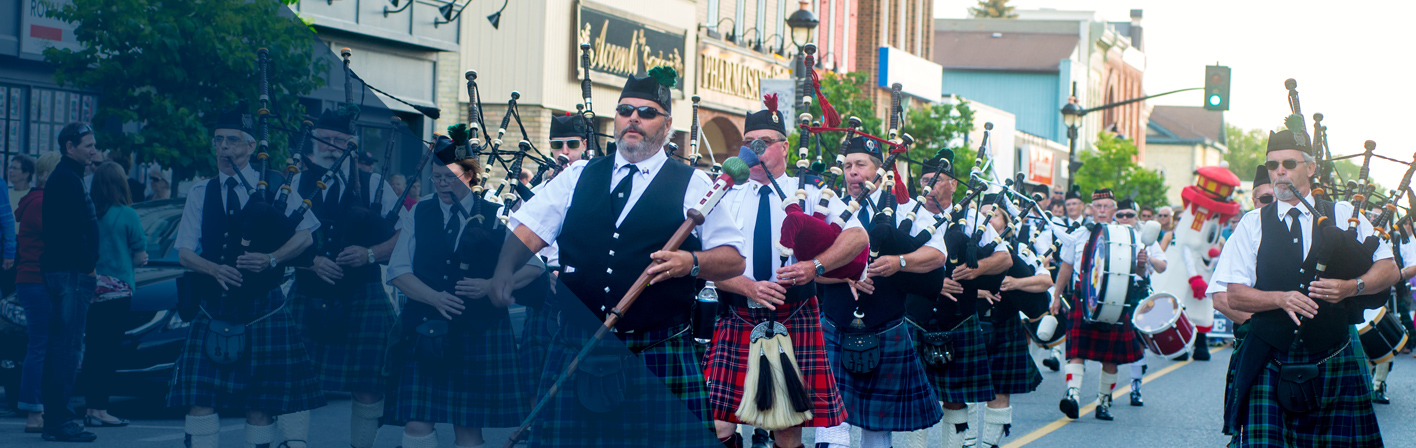Pipe band marching in the streets of Kincardine